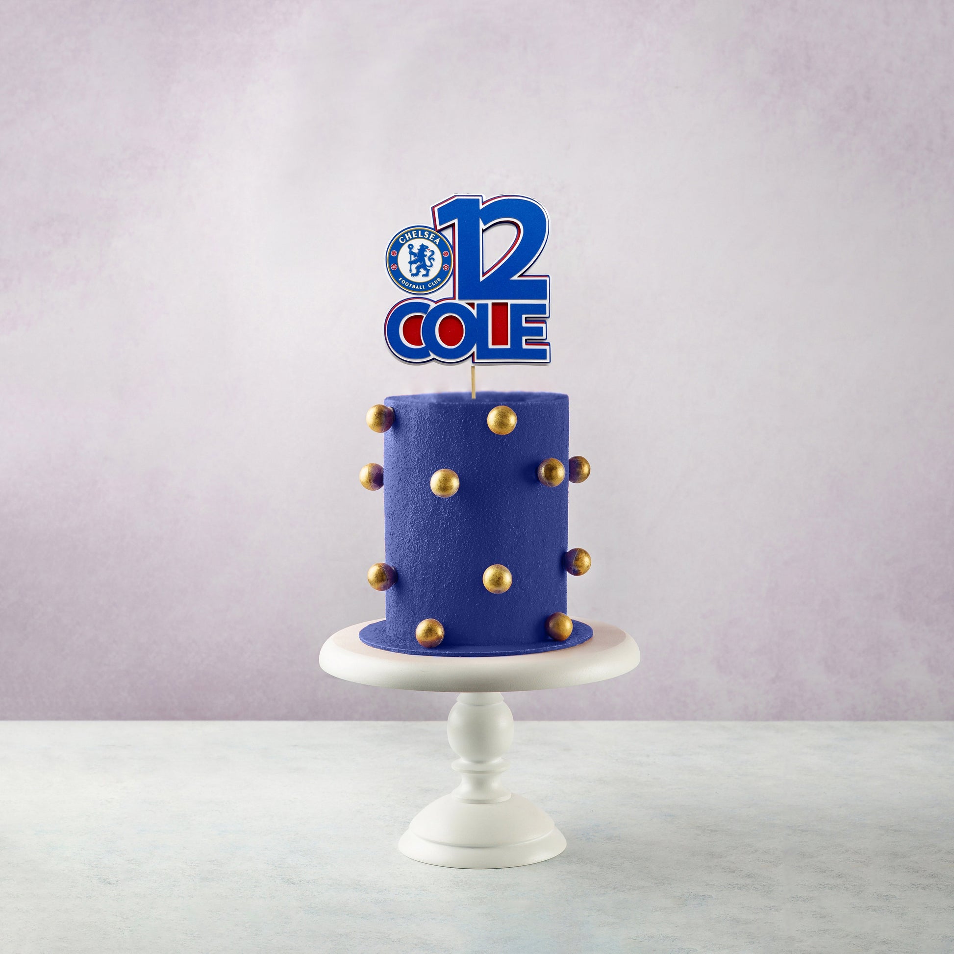 Non-edible cake decoration in Chelsea FC colours