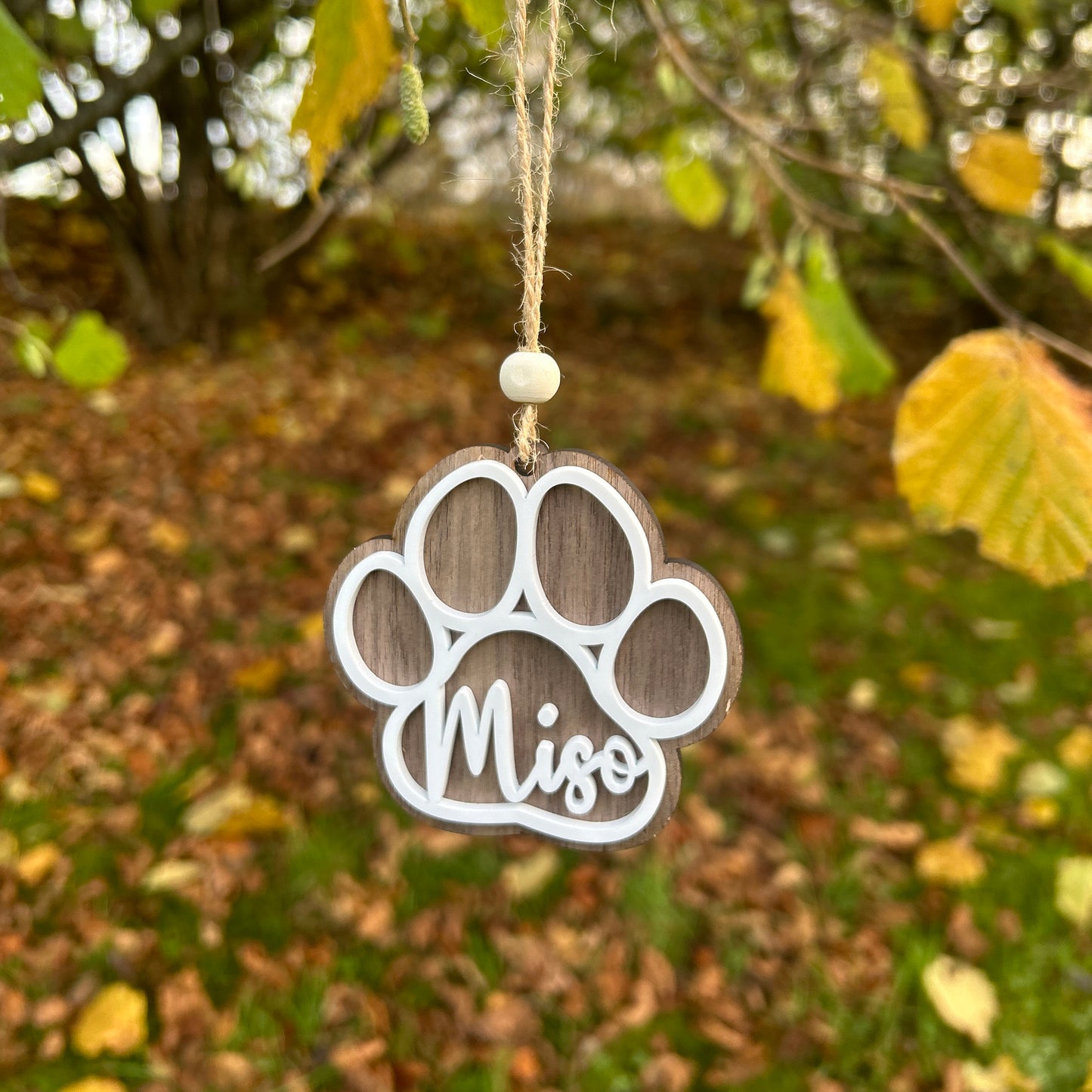 Personalised paw print festive ornament