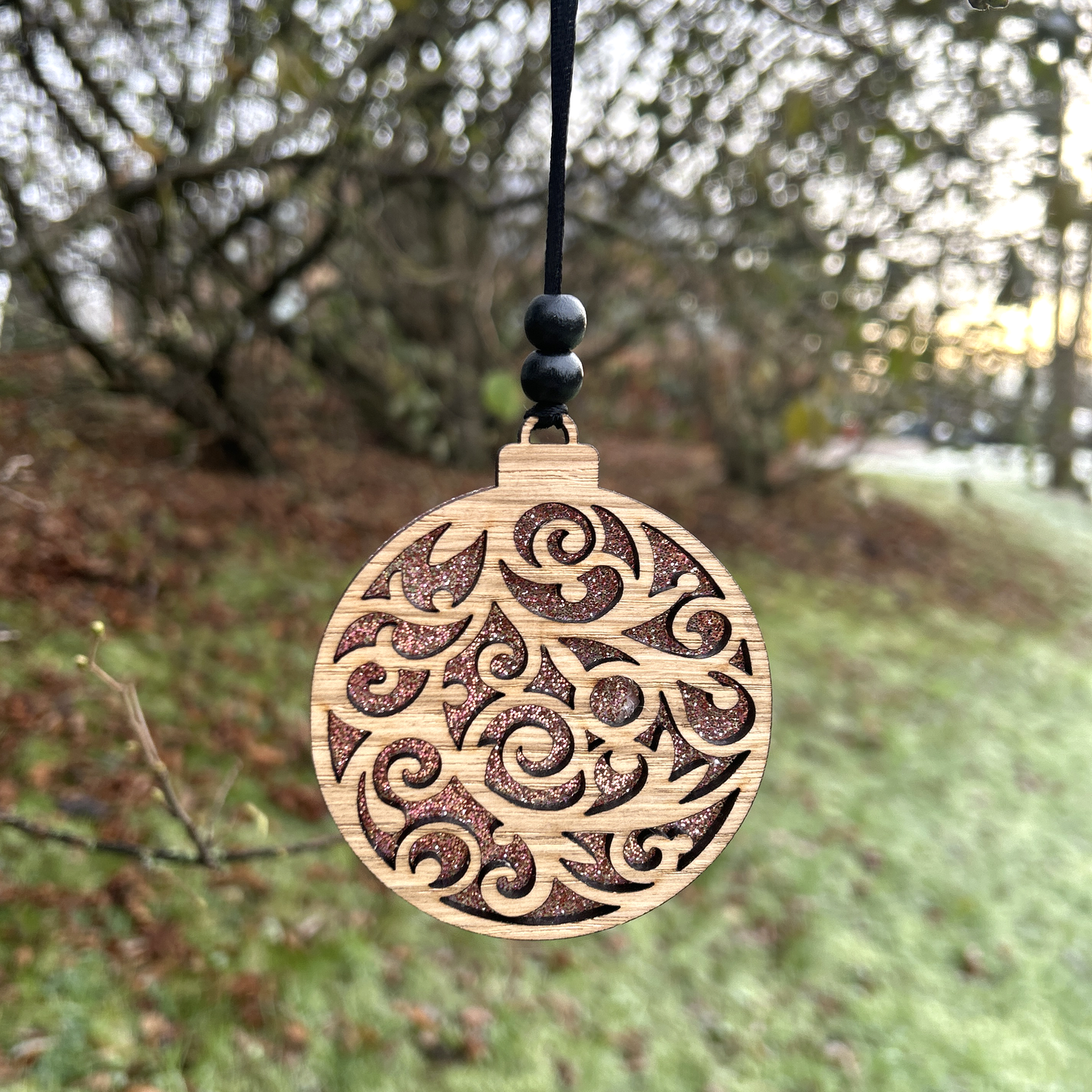 Swirly 2 layer Christmas ornament in Oak and rose gold glitter